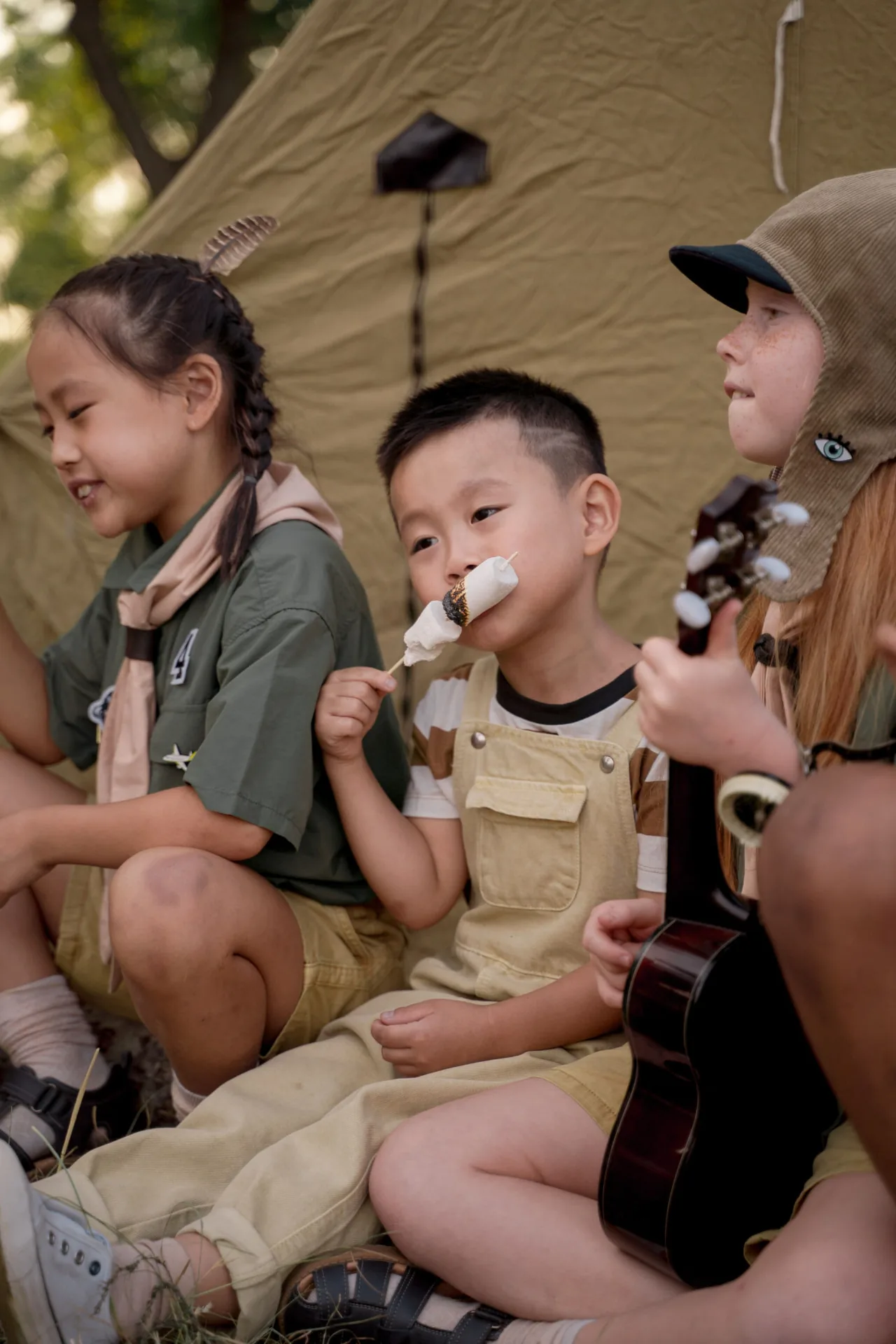 Children enjoying camping activities at the festival